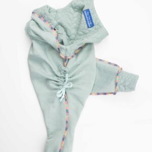 Showing the gathered pocket in our Cable Knit Grow WIth Me Romper