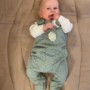 Baby wearing Mint Green Cable Knit Grow With Me Romper